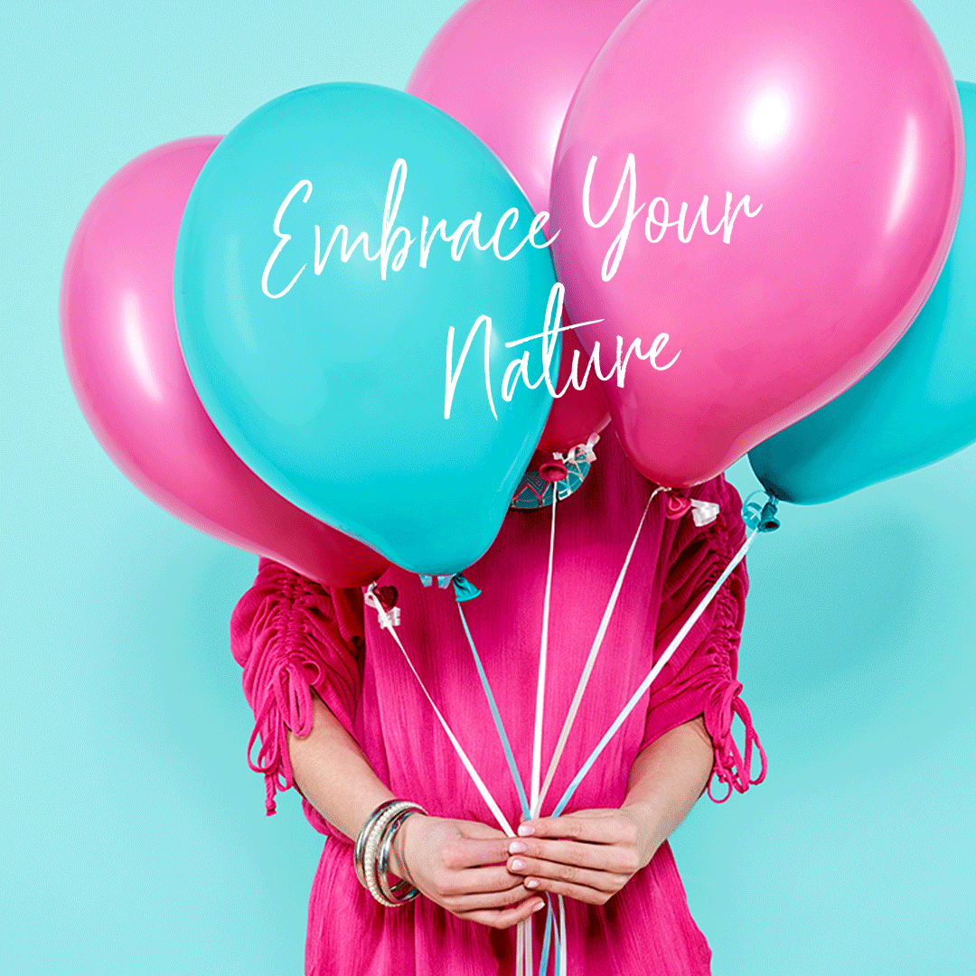 Girl holding balloons with text overlay to embrace your nature